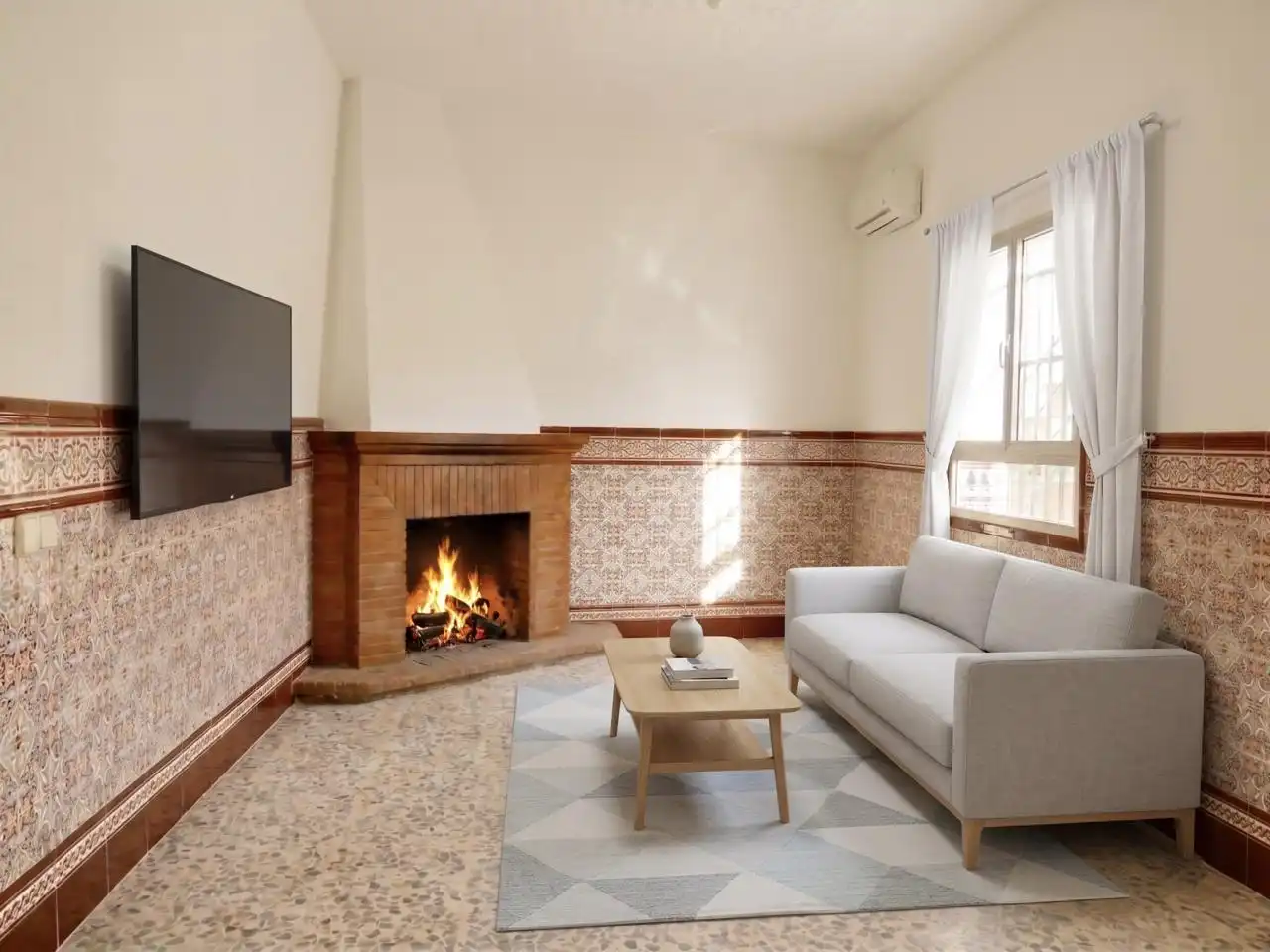 Sala de estar de Casa adosada en venta en Umbrete con Aire acondicionado, Terraza y Balcón