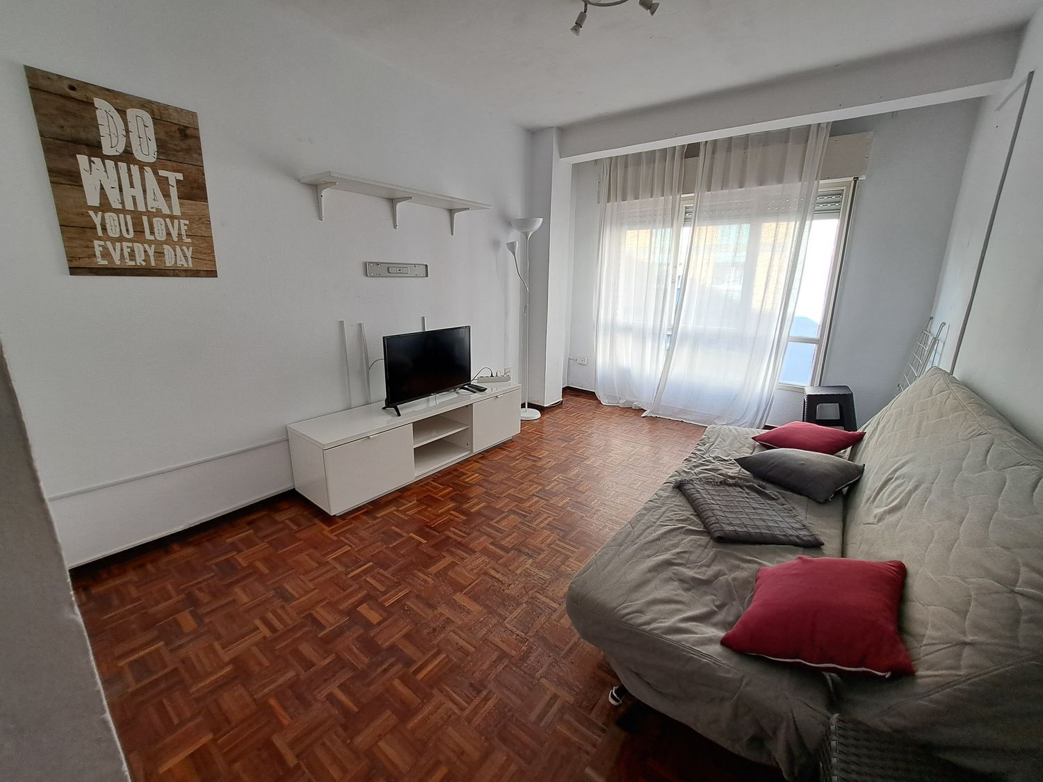 Sala d'estar de Pis de lloguer en Gijón  amb Piscina