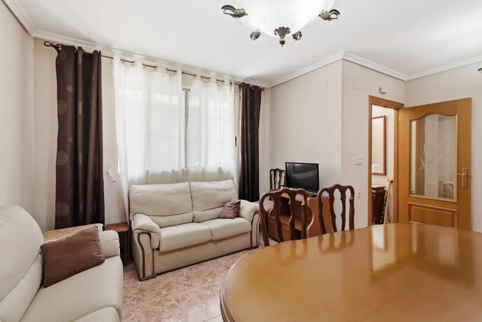 Sala d'estar de Casa adosada en venda en Torrent