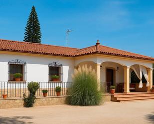 Exterior view of House or chalet to rent in Sanlúcar la Mayor  with Air Conditioner, Heating and Private garden