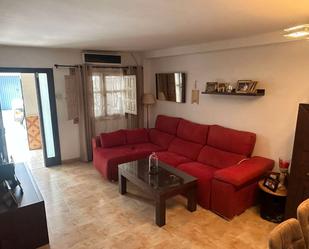 Sala d'estar de Casa adosada en venda en Vélez-Málaga amb Aire condicionat i Terrassa