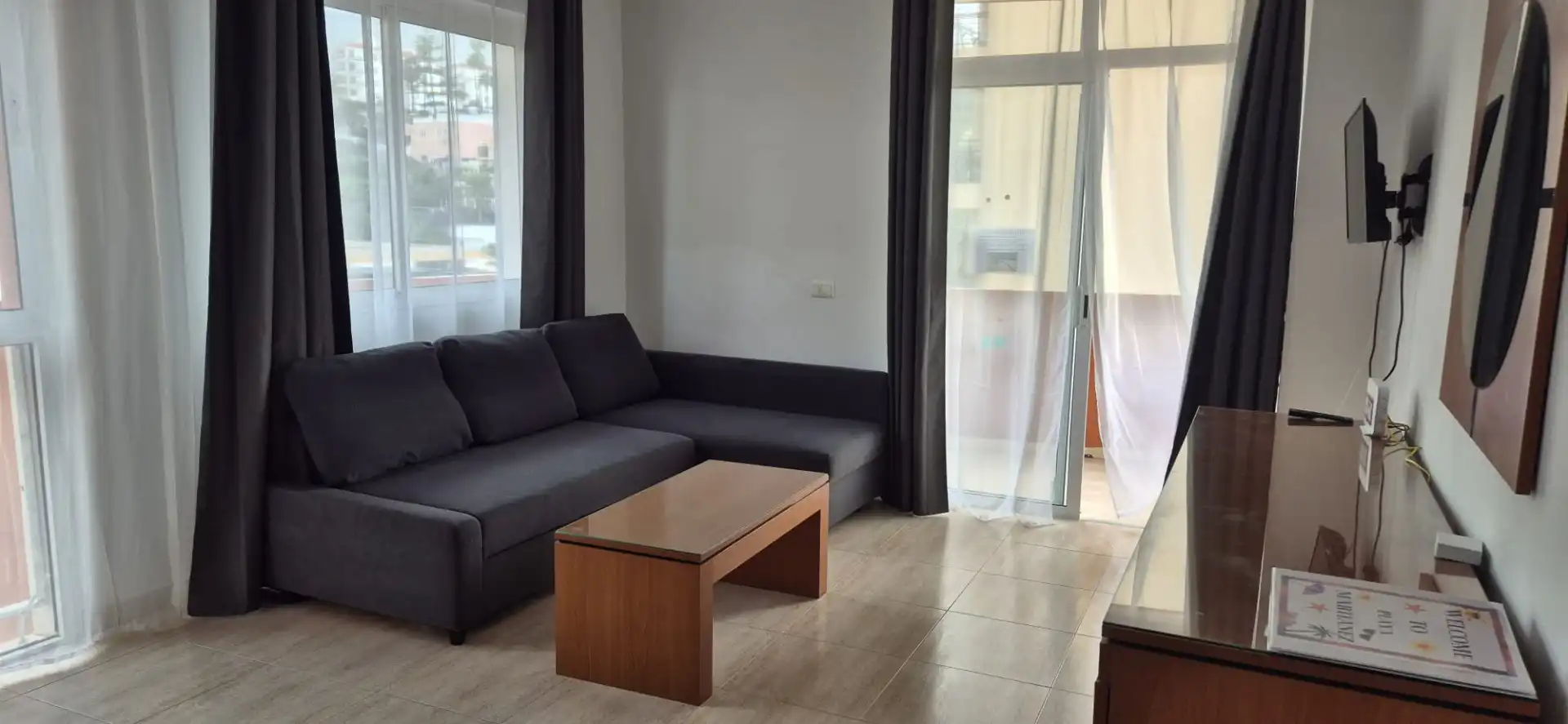 Living room of Flat for sale in Puerto de la Cruz  with Terrace, Furnished and Oven
