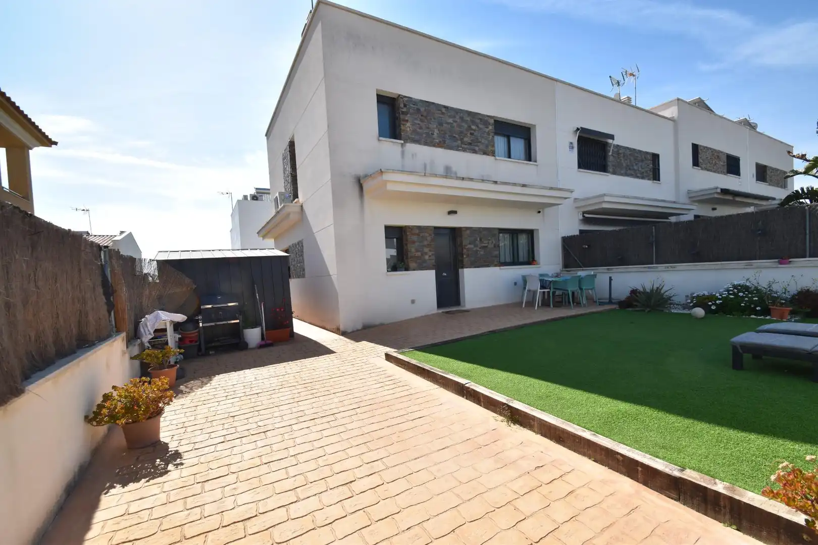 Jardí de Casa adosada en venda en Cunit amb Aire condicionat, Jardí privat i Terrassa