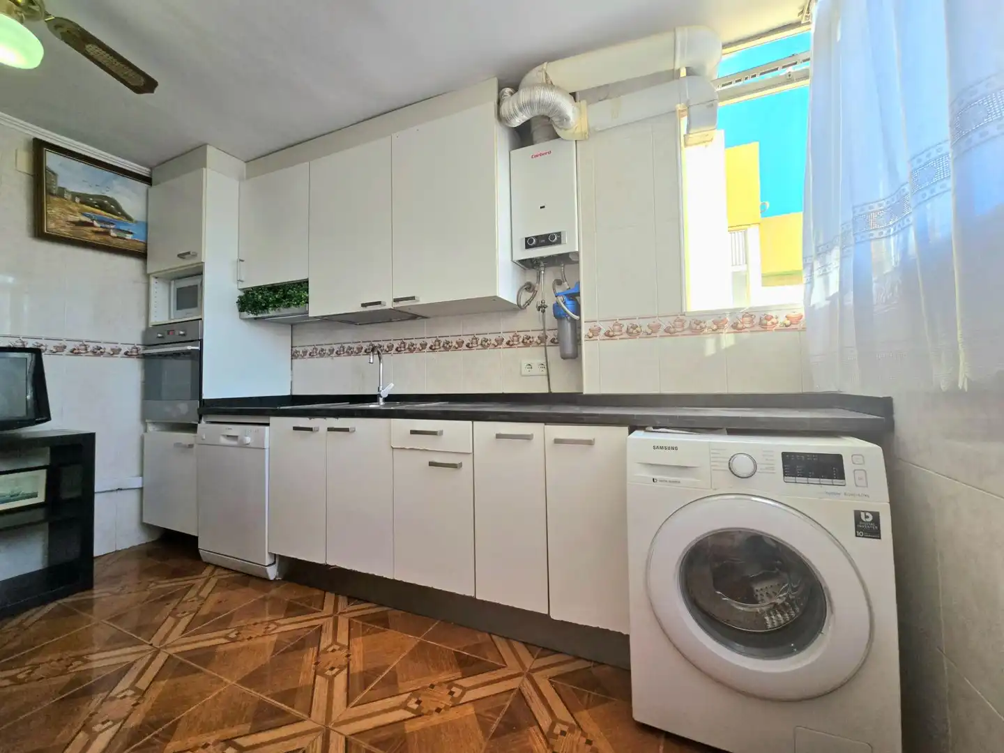 Küche von Wohnung zum Verkauf in Torremolinos mit Klimaanlage, Privatgarten und Terrasse