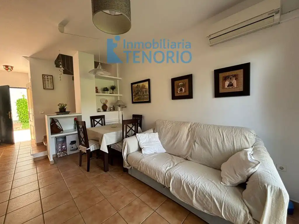 Sala de estar de Casa adosada en venta en Islantilla con Aire acondicionado, Terraza y Trastero