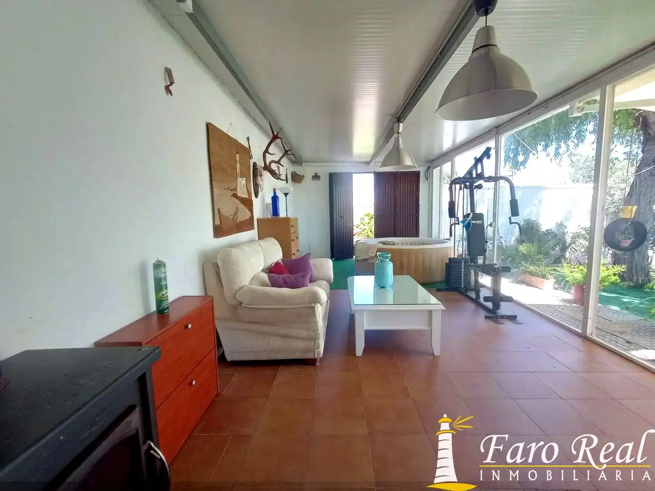 Sala de estar de Finca rústica de alquiler en Sanlúcar de Barrameda con Aire acondicionado, Jardín privado y Piscina