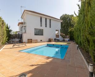 Swimming pool of Single-family semi-detached for sale in Atarfe  with Air Conditioner, Heating and Private garden