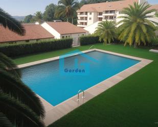 Swimming pool of House or chalet for sale in Sanxenxo  with Heating, Terrace and Storage room