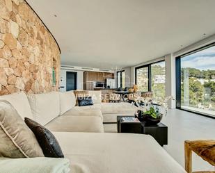 Sala d'estar de Casa o xalet en venda en Santa Eulària des Riu amb Aire condicionat, Jardí privat i Piscina