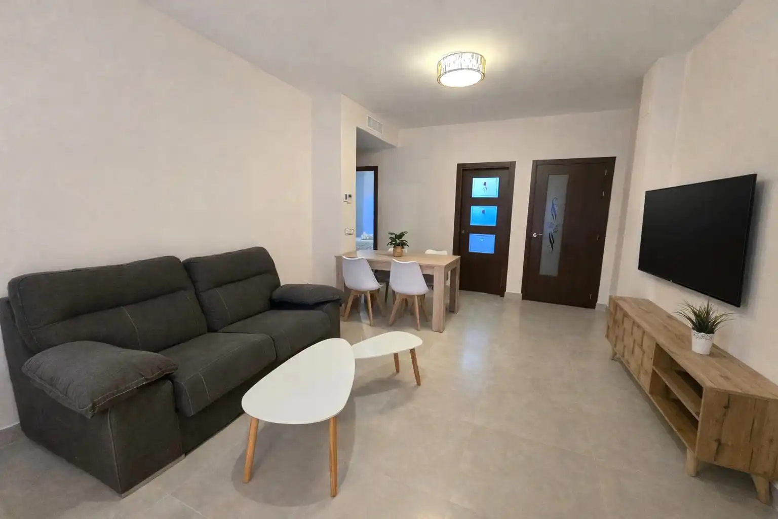 Sala de estar de Piso de alquiler en Sanlúcar la Mayor con Aire acondicionado, Amueblado y TV