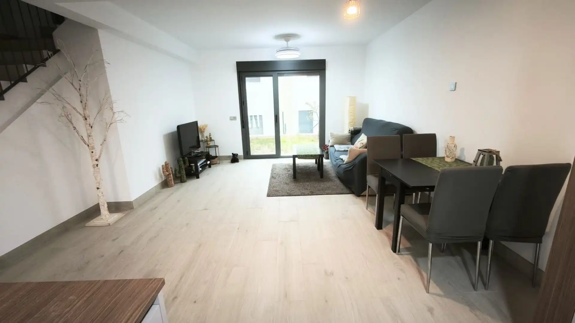 Sala d'estar de Casa adosada en venda en Vélez-Málaga amb Jardí privat, Terrassa i Traster