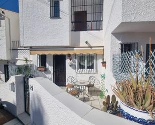 Exterior view of Single-family semi-detached for sale in Nerja  with Air Conditioner and Terrace