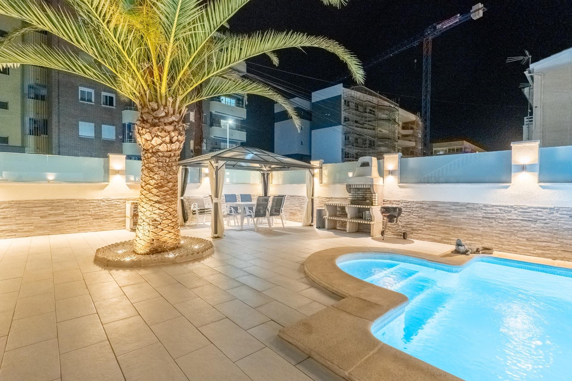 Swimming pool of Single-family semi-detached for sale in Torrevieja  with Air Conditioner, Private garden and Terrace