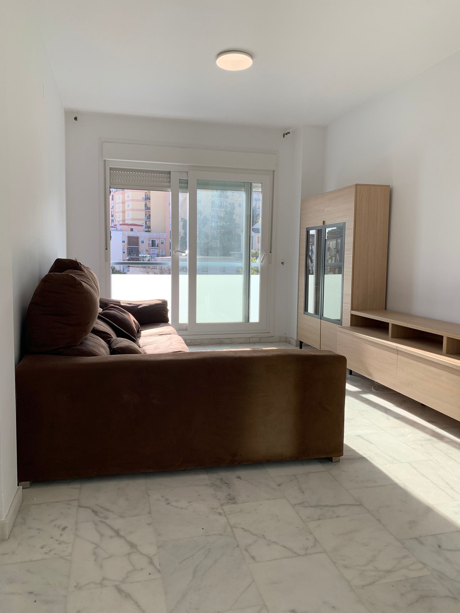 Sala d'estar de Pis de lloguer en  Huelva Capital amb Aire condicionat i Moblat