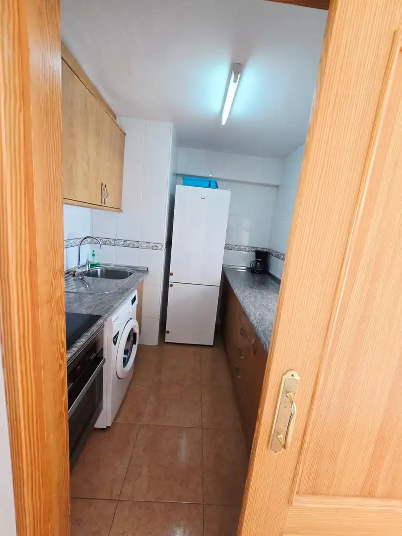 Cuina de Apartament en venda en Benidorm amb Aire condicionat, Moblat i Piscina comunitària