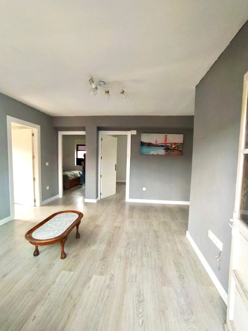 Living room of Flat for sale in Gijón   with Heating, Private garden and Parquet flooring