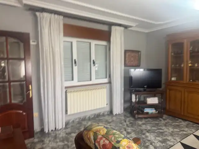 Sala d'estar de Casa o xalet en venda en Castropol amb Calefacció, Jardí privat i Parquet