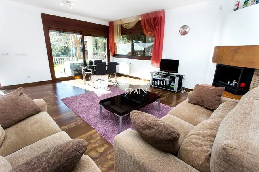 Sala d'estar de Casa o xalet en venda en Lloret de Mar amb Aire condicionat, Calefacció i Jardí privat