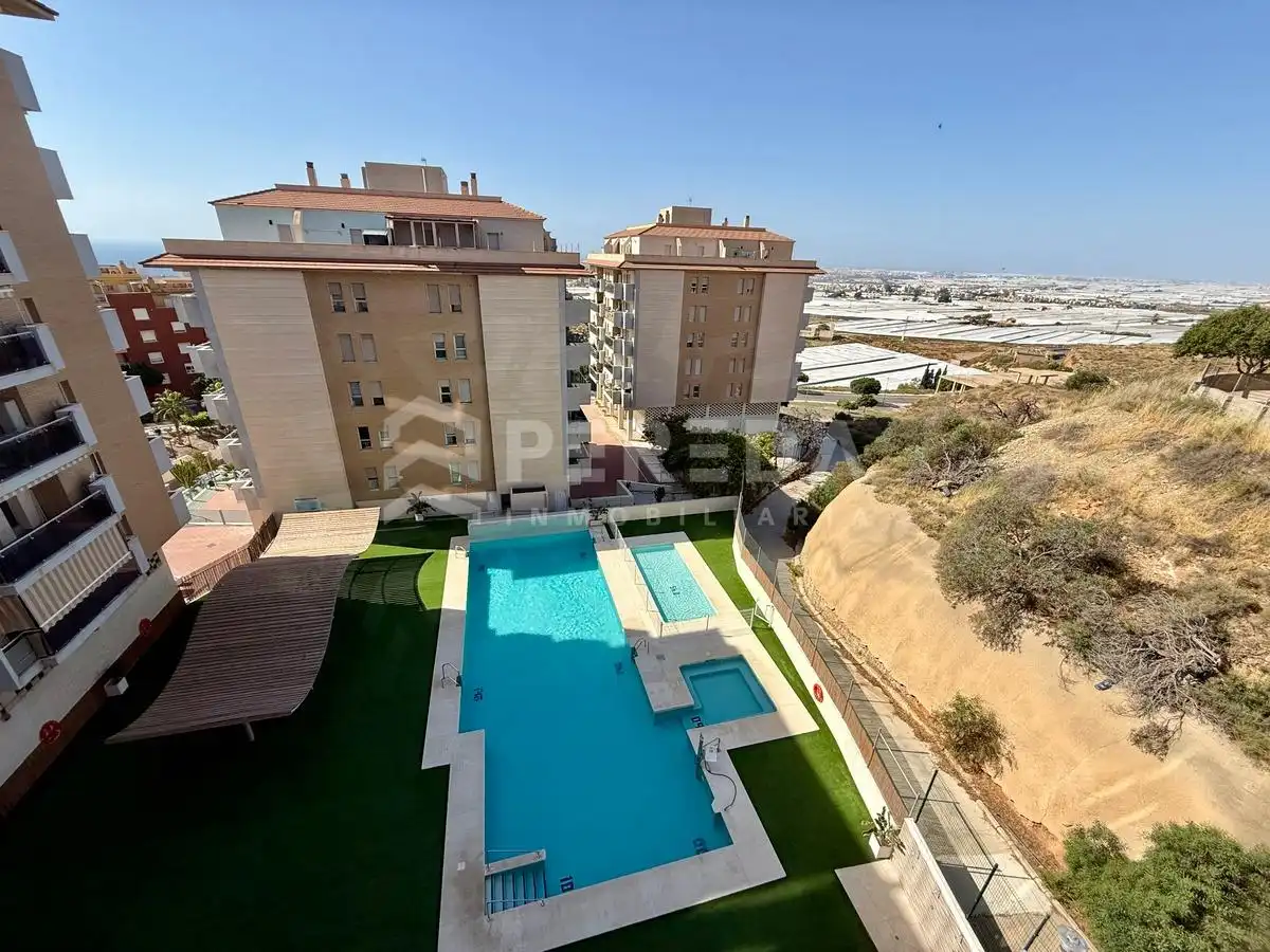 Swimming pool of Flat for sale in Roquetas de Mar  with Private garden, Terrace and Community pool