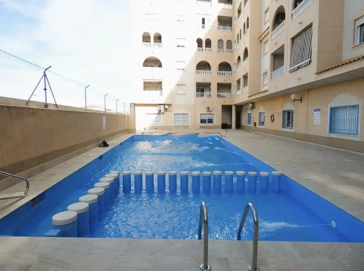 Swimming pool of Ground floor for sale in Torrevieja  with Air Conditioner, Terrace and Community pool