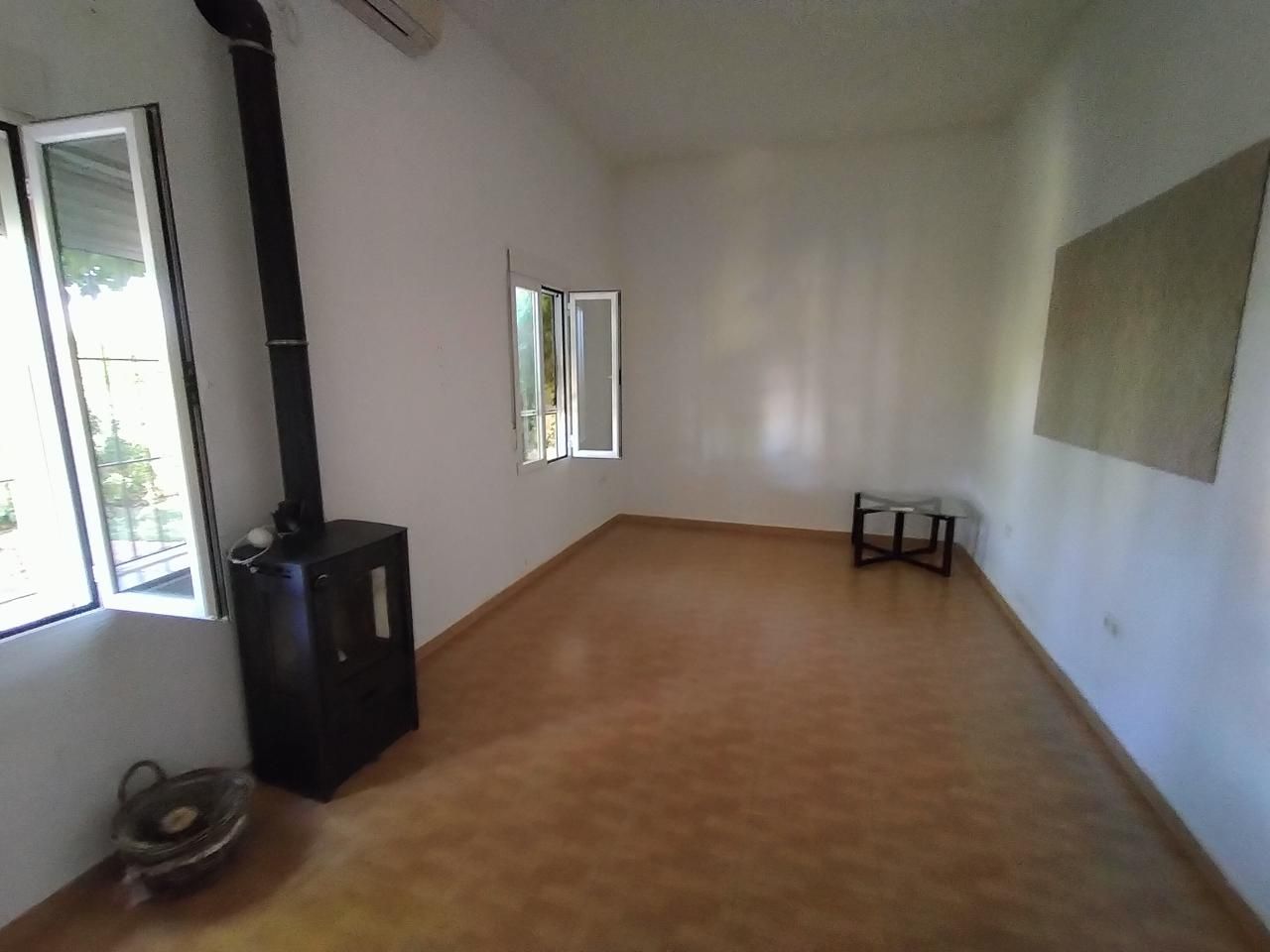 Sala d'estar de Casa o xalet en venda en  Córdoba Capital amb Aire condicionat i Jardí privat