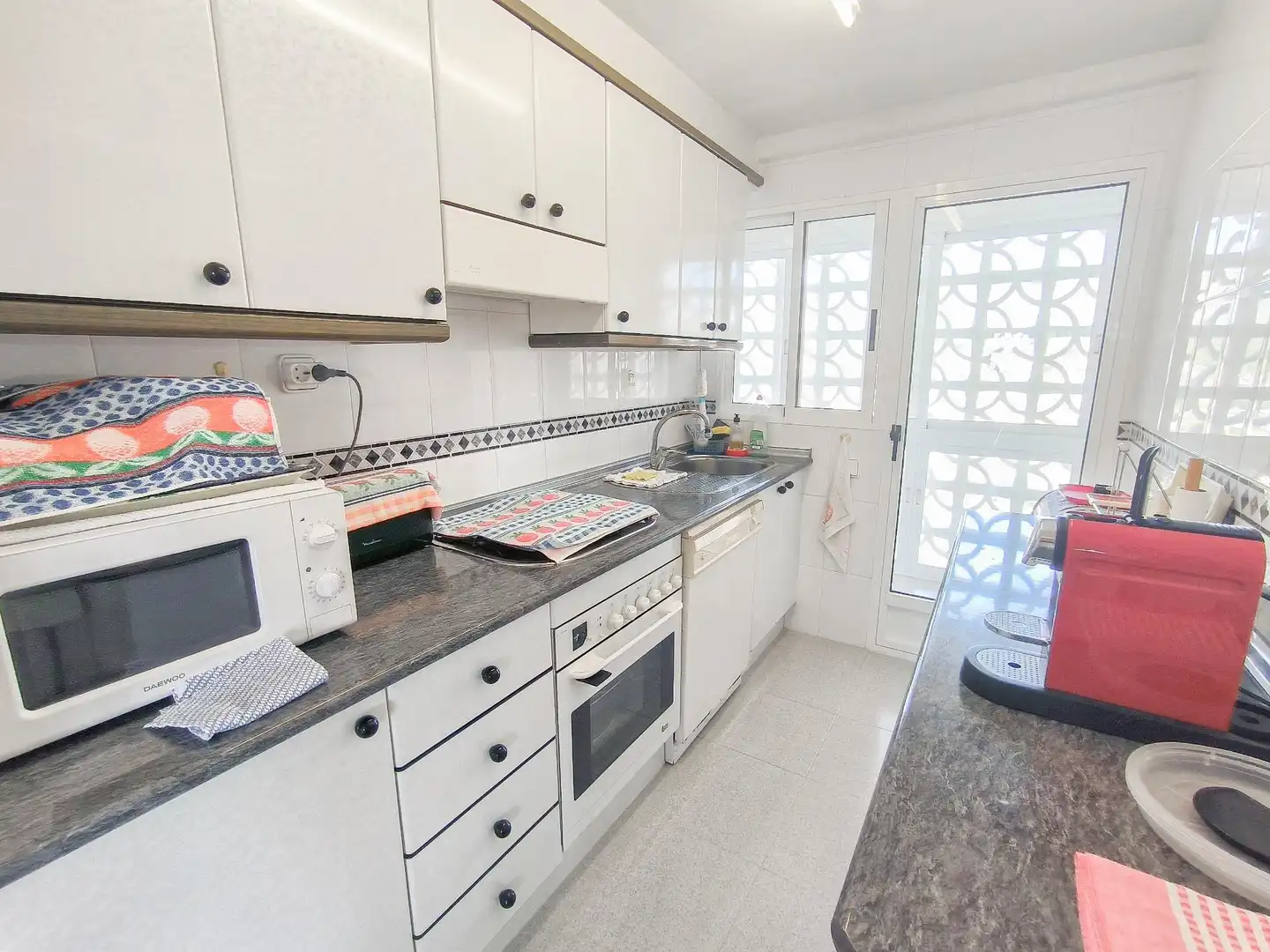 Kitchen of Flat for sale in Benidorm  with Private garden, Terrace and Furnished