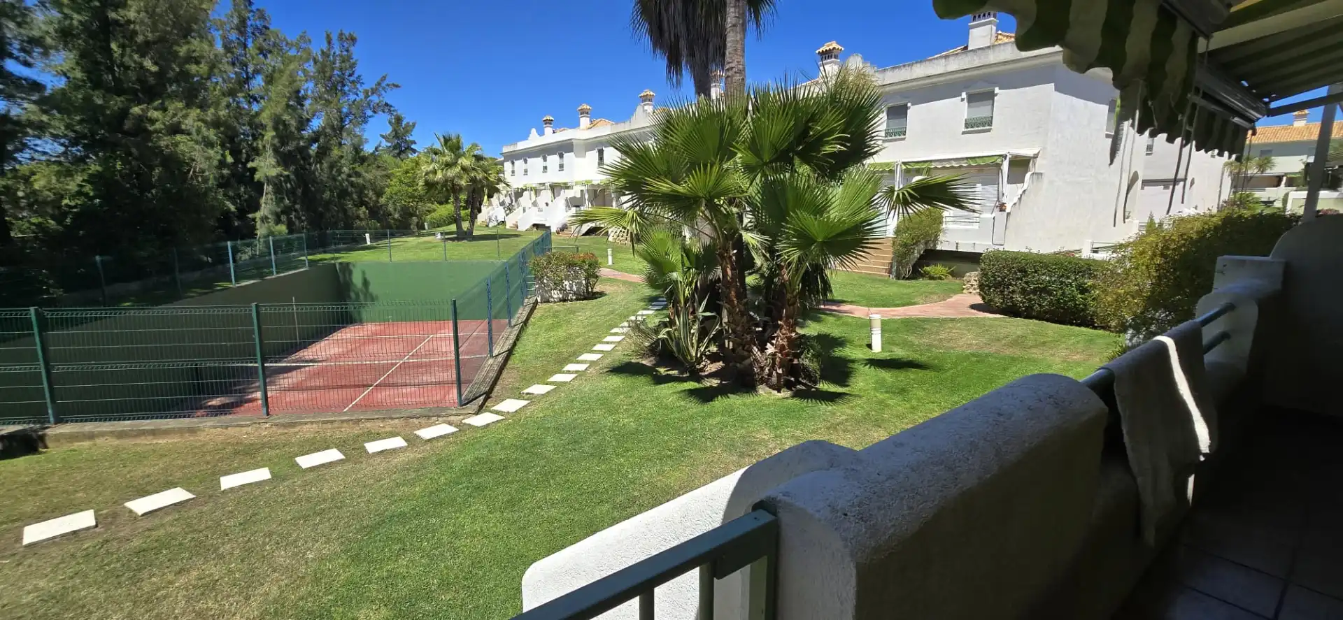 Jardín de Casa adosada en venta en El Portil con Calefacción, Trastero y Amueblado