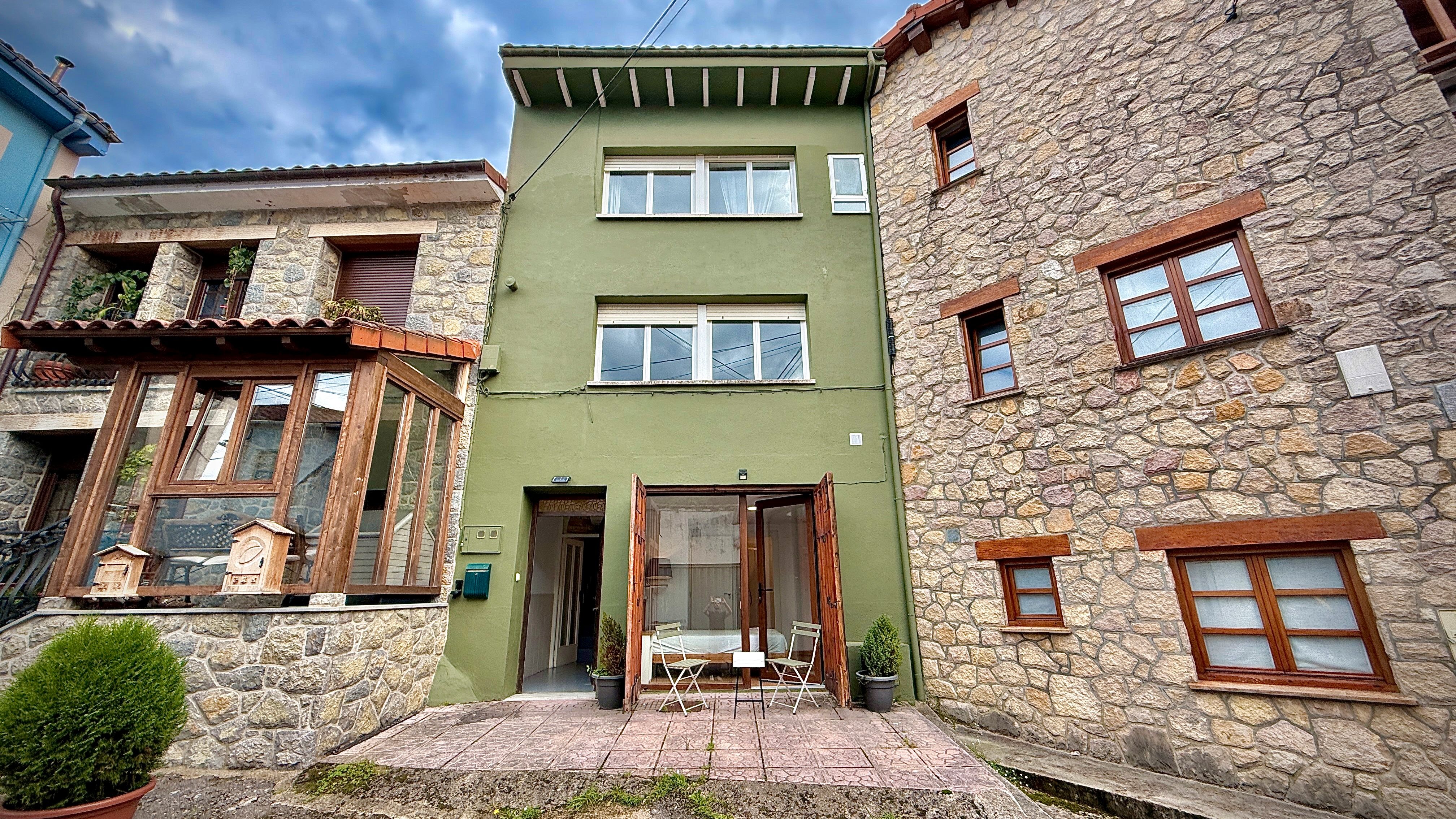 Exterior view of Single-family semi-detached for sale in Llanes  with Parquet flooring, Terrace and Washing machine