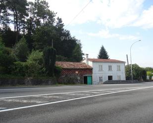 Vista exterior de Casa o xalet en venda en Santiago de Compostela  amb Jardí privat, Traster i Moblat