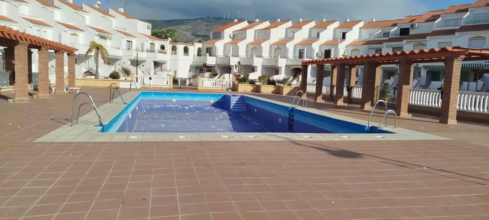 Piscina de Casa adosada en venta en Motril con Aire acondicionado, Terraza y Trastero