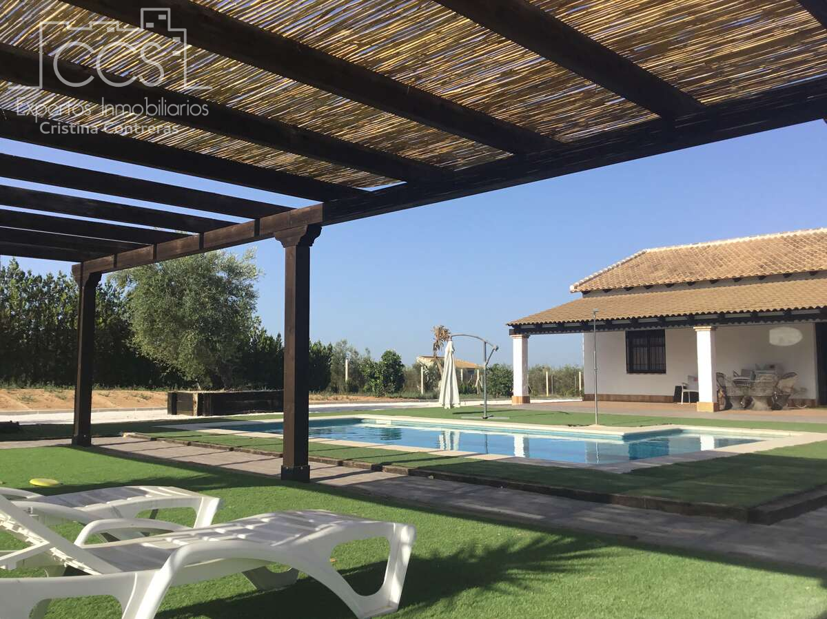 Garden of Country house for sale in Pilas  with Air Conditioner, Storage room and Swimming Pool