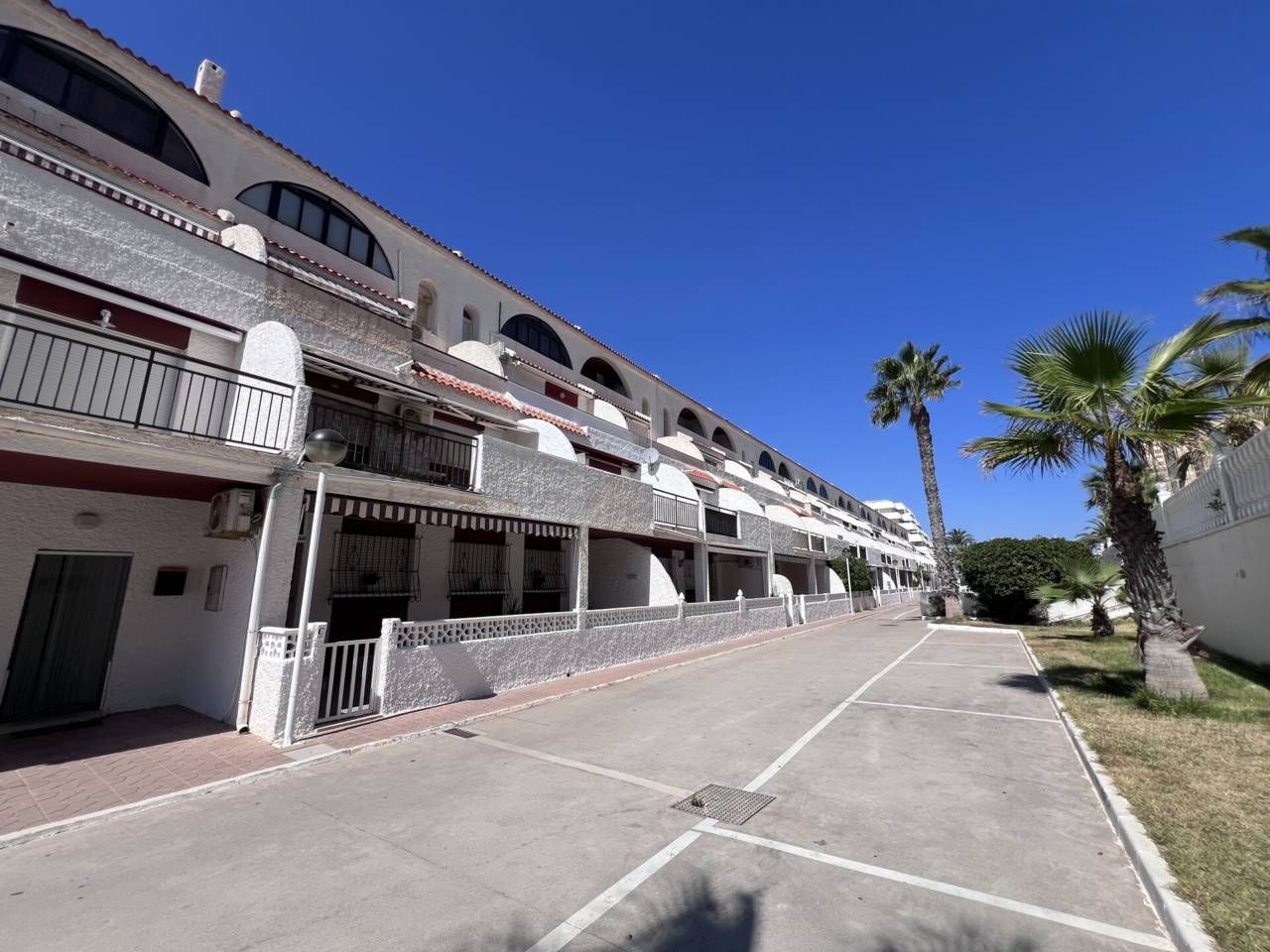 Exterior view of Duplex for sale in La Manga del Mar Menor  with Terrace, Furnished and Community pool
