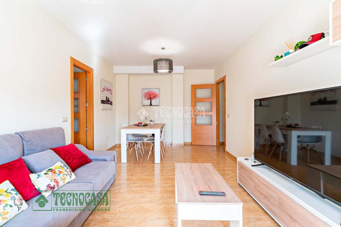 Living room of Flat for sale in Roquetas de Mar