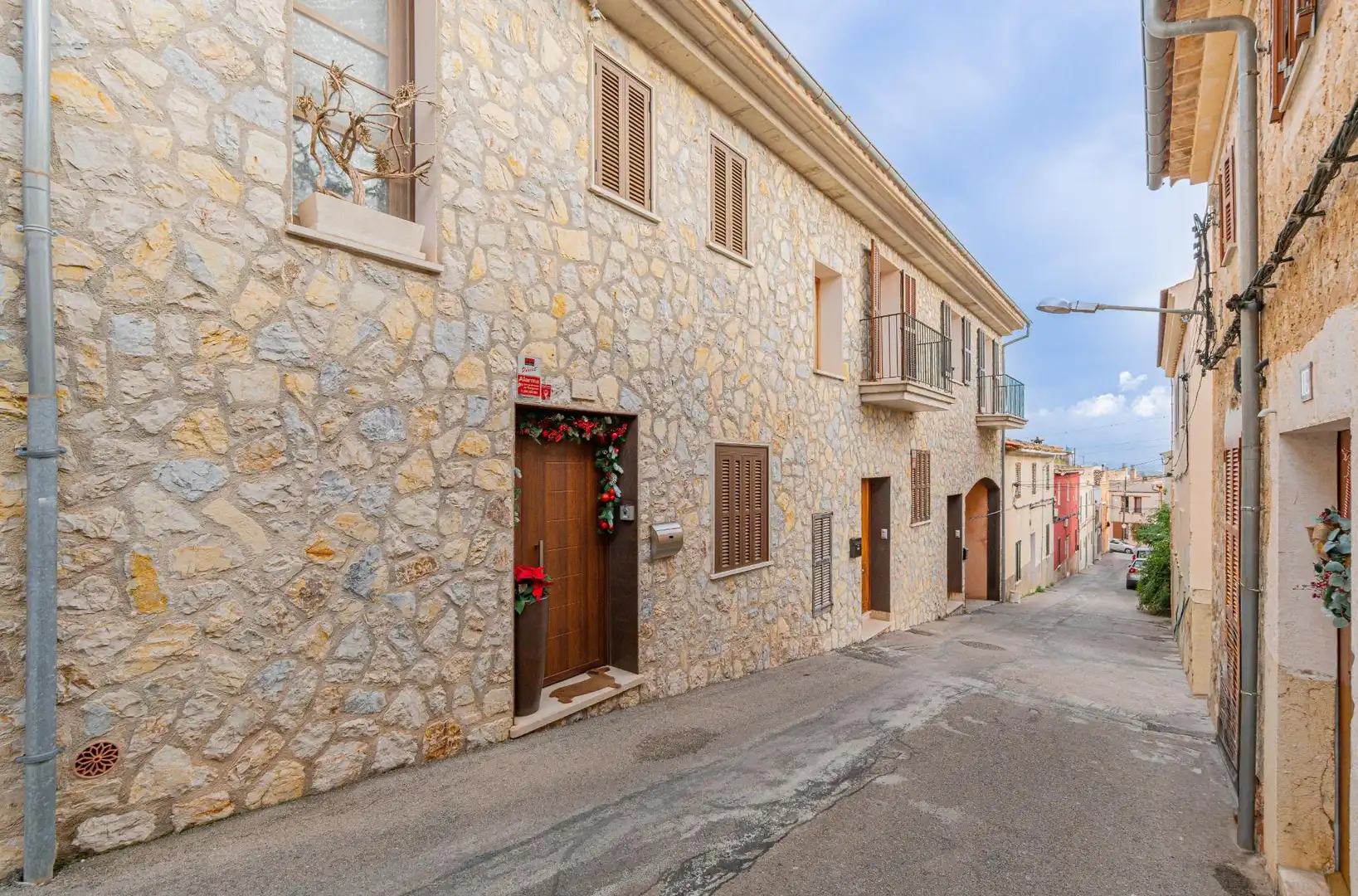 Vista exterior de Casa adosada en venda en Lloseta amb Aire condicionat, Calefacció i Terrassa