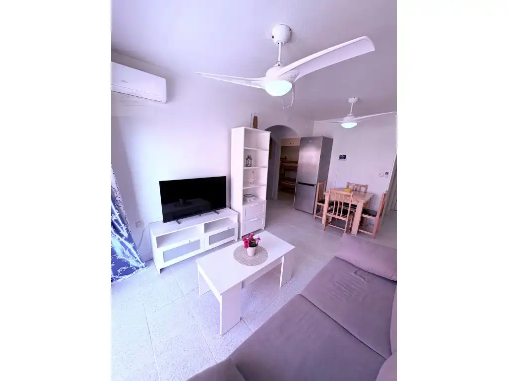 Sala d'estar de Apartament en venda en Mazarrón amb Aire condicionat, Moblat i Piscina comunitària
