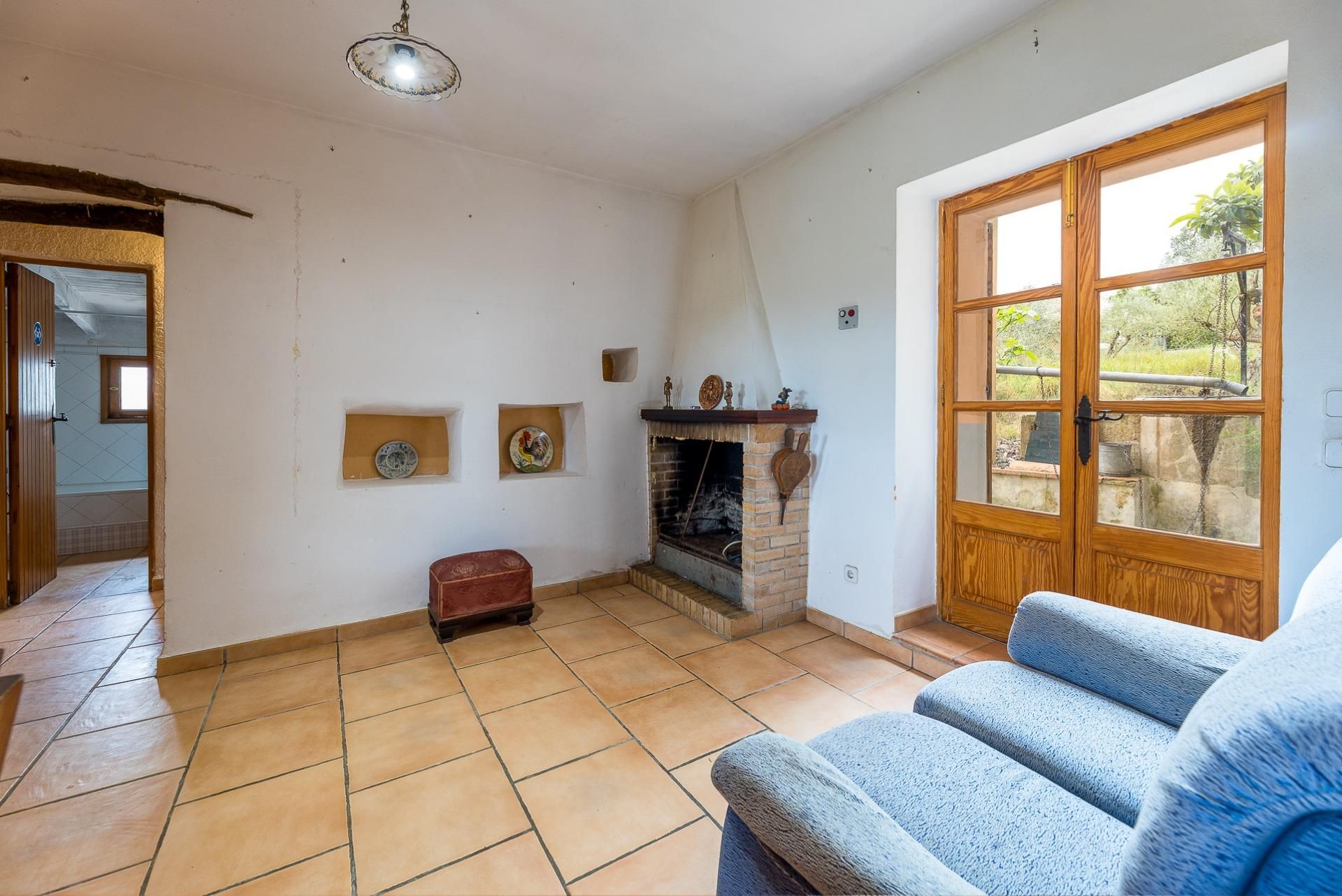 Sala d'estar de Finca rústica en venda en Sineu amb Jardí privat, Terrassa i Traster