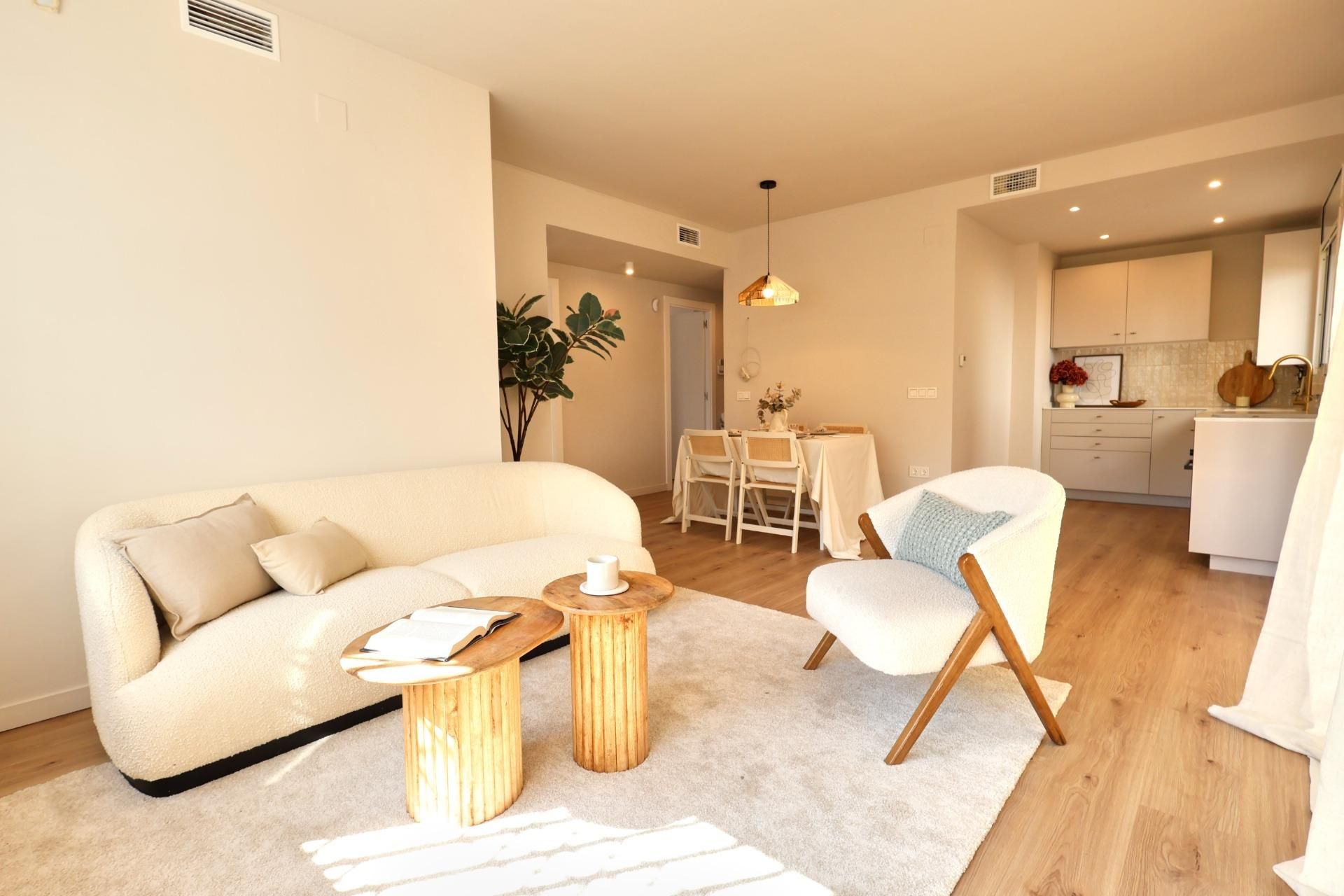 Living room of Planta baja for sale in Vilanova i la Geltrú  with Parquet flooring, Terrace and Community pool