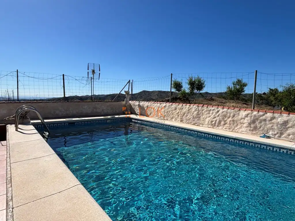 Swimming pool of Houses for sale in El Borge  with Terrace and Swimming Pool
