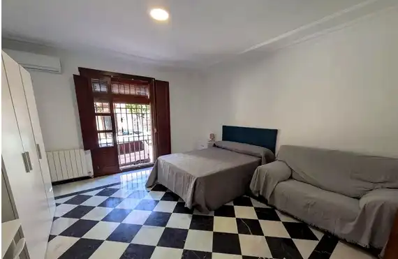 Habitación de Casa o chalet para compartir en Linares con Aire acondicionado, Terraza y Amueblado