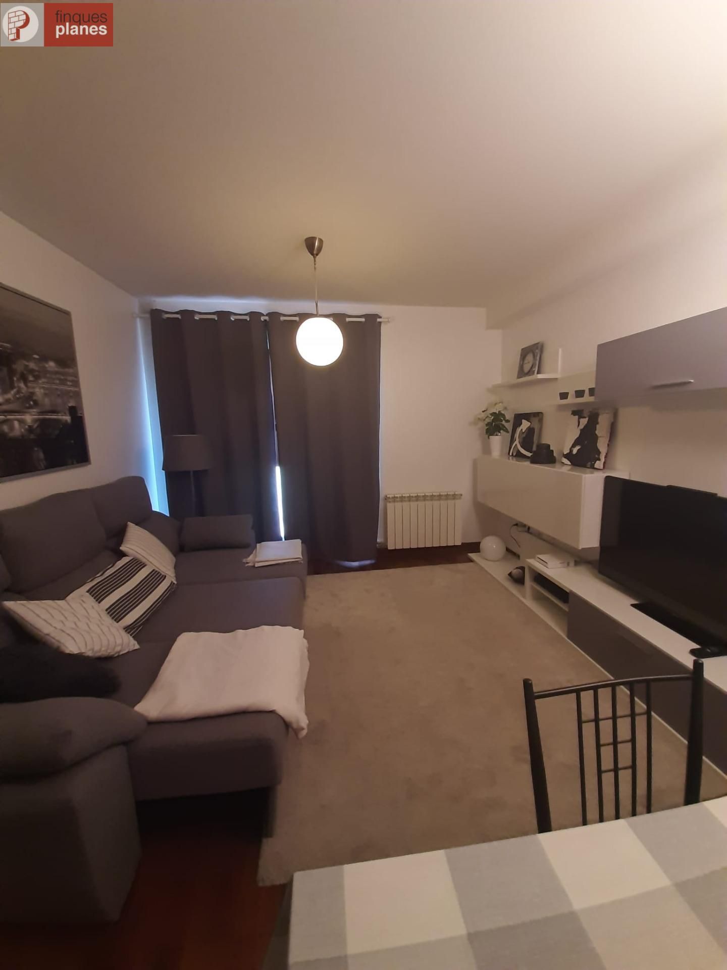 Sala d'estar de Apartament de lloguer en Organyà amb Calefacció