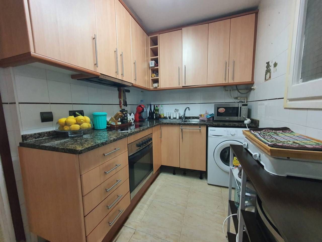 Kitchen of Flat for sale in Vilanova i la Geltrú  with Air Conditioner and Balcony