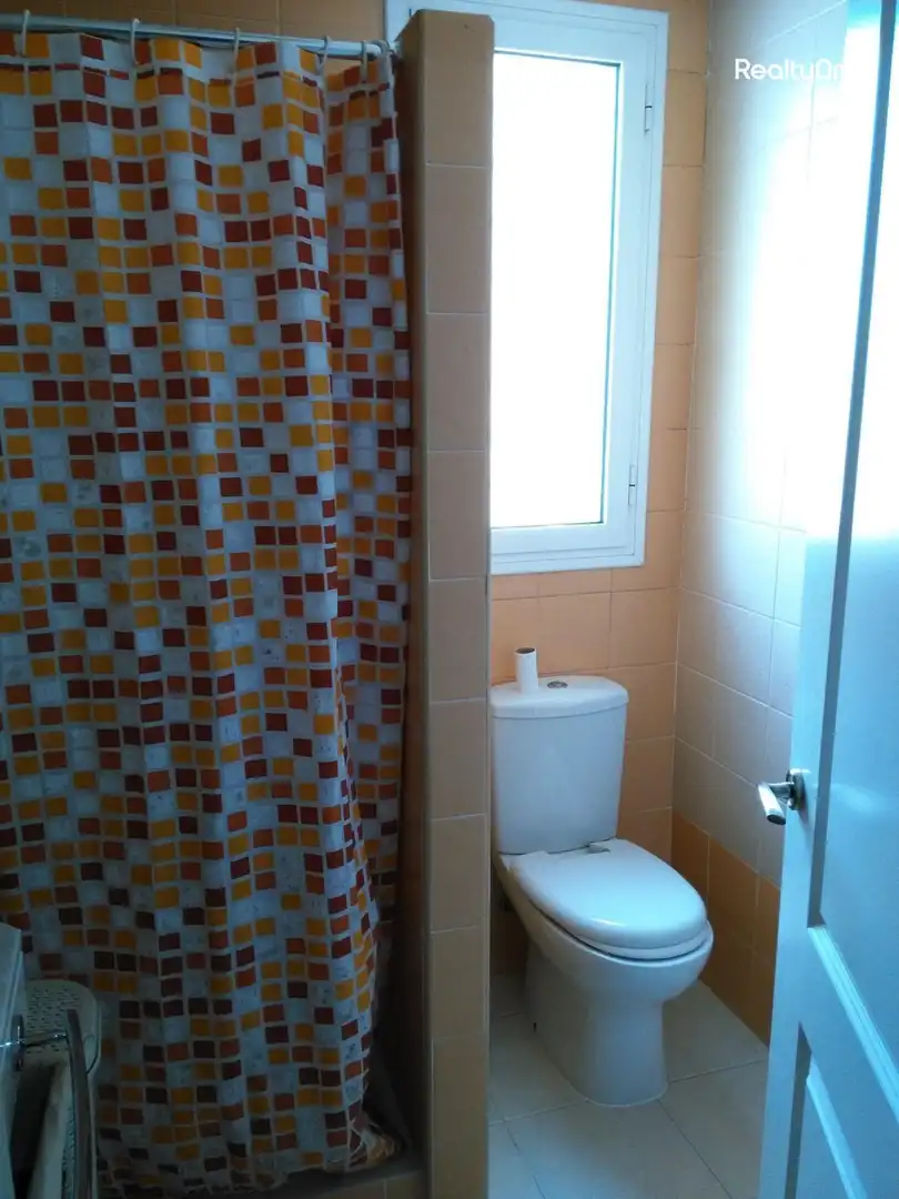 Baño de Casa adosada en venta en Umbrete con Aire acondicionado, Calefacción y Jardín privado