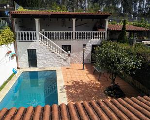 Piscina de Casa adosada en venda en Redondela amb Calefacció, Jardí privat i Parquet