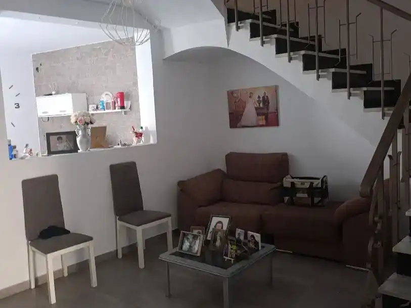 Sala de estar de Casa adosada en venta en Marmolejo con Aire acondicionado, Trastero y Amueblado
