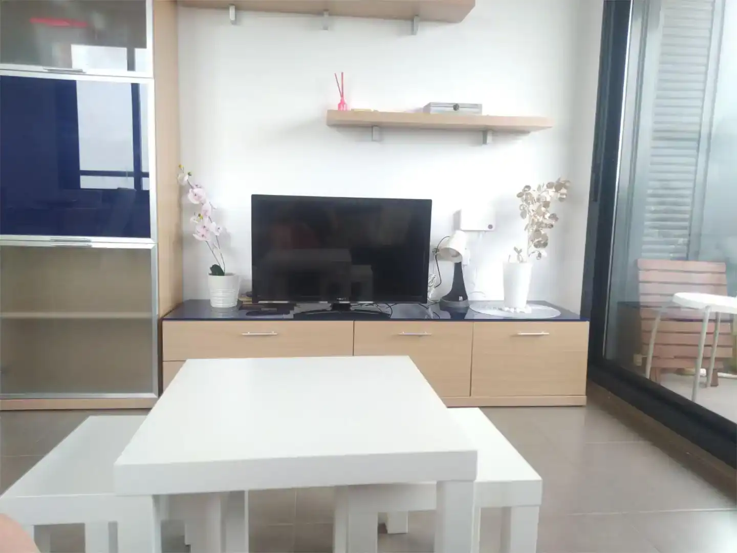 Sala d'estar de Apartament de lloguer en Alcanar amb Aire condicionat, Jardí privat i Piscina