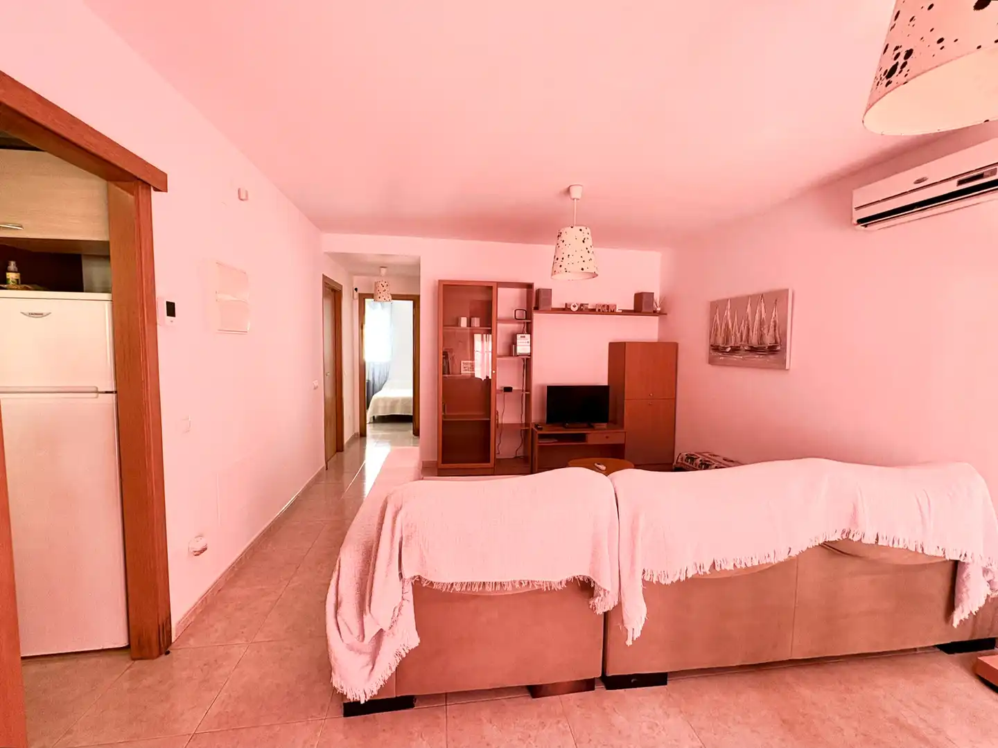 Sala d'estar de Casa adosada de lloguer en Sant Jaume d'Enveja amb Aire condicionat, Terrassa i Moblat