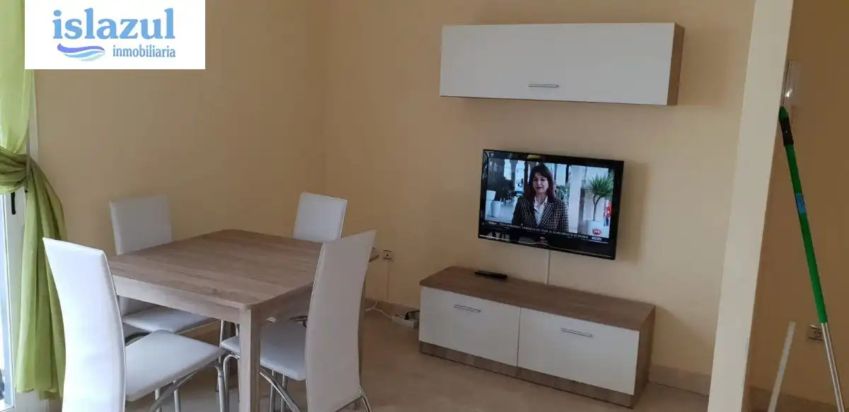 Sala de estar de Apartamento de alquiler en Isla Cristina con Aire acondicionado, Jardín privado y Terraza