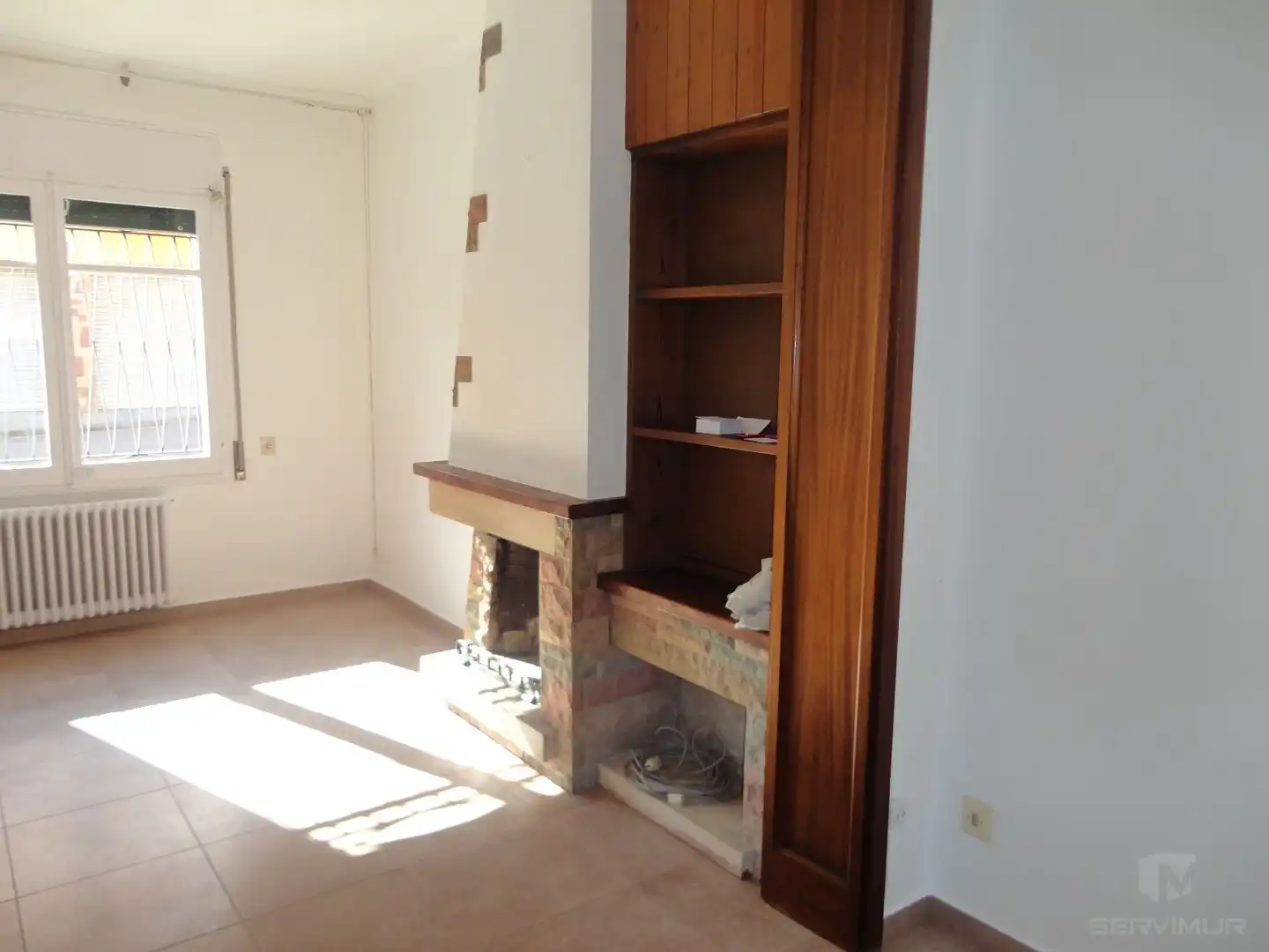 Sala de estar de Casa adosada en venta en Manlleu
