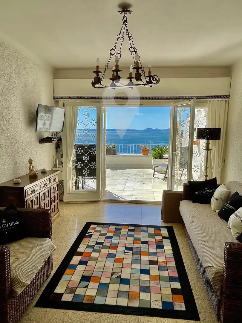 Sala de estar de Piso en venta en Roses con Aire acondicionado, Trastero y Amueblado