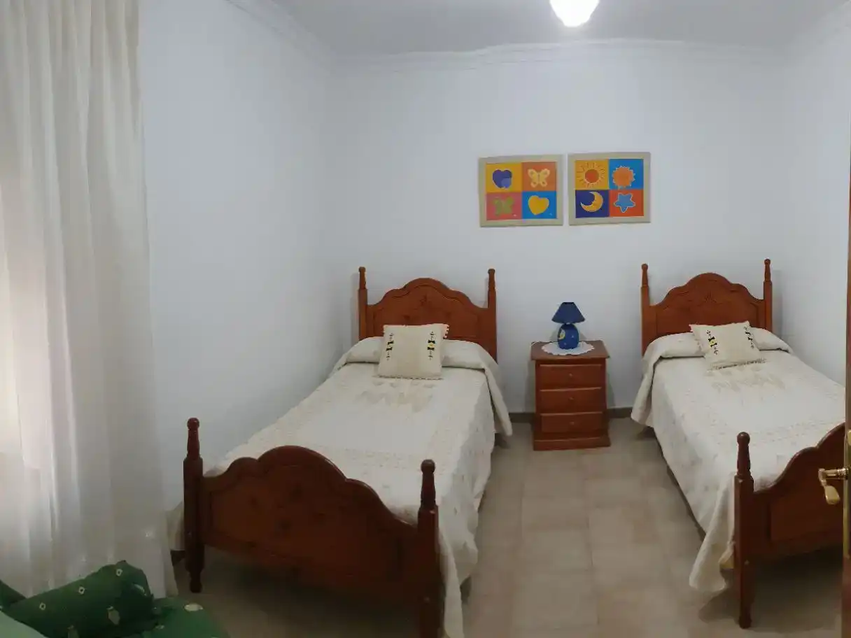 Dormitori de Casa adosada en venda en El Campillo (Huelva) amb Traster i Moblat
